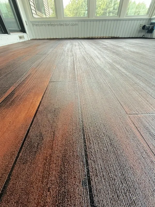 Rustic Concrete Wood plank floor coating in deep red for a sunroom